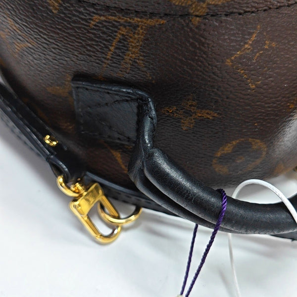 Authenticated pre-owned  PALM SPRINGS Mini Monogram Coated Canvas Brown - Backpack at Looply