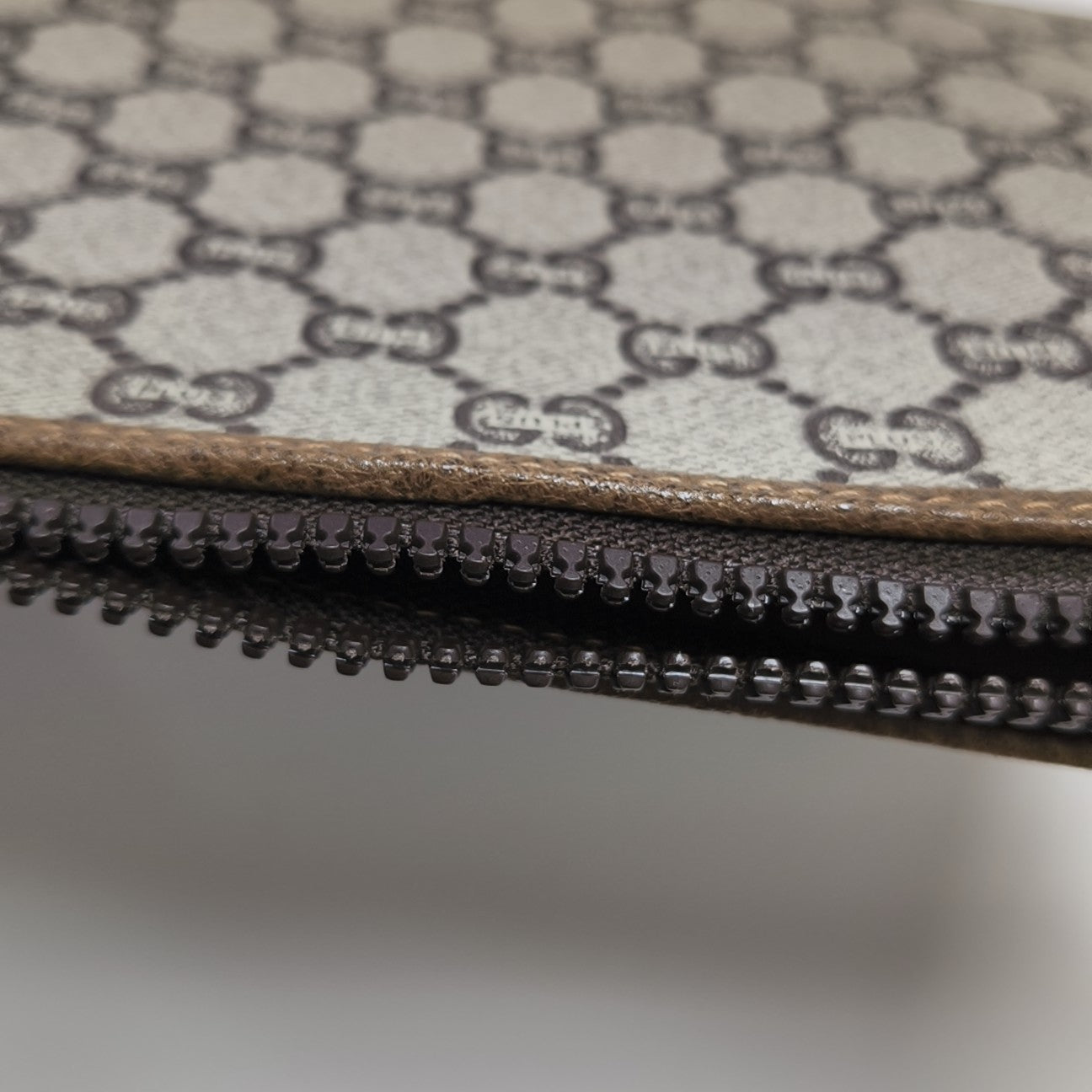 Monogram Coated Canvas Clutch Beige