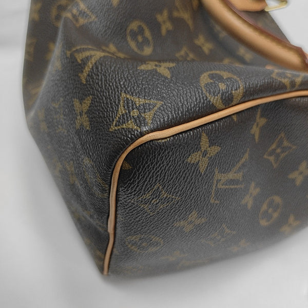 SPEEDY 25 Monogram Coated Canvas Brown