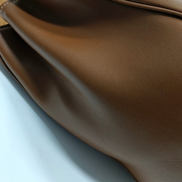 Authenticated pre-owned  16 Medium Calfskin Brown - Top Handle Bag at Looply