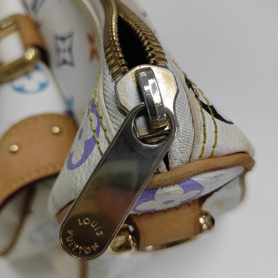 LV × TM RITA Monogram Coated Canvas White