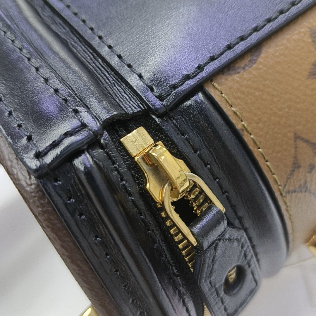 CANNES PM Monogram Coated Canvas Brown