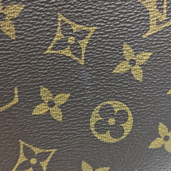 TOILET POCKET 26 Monogram Coated Canvas Brown