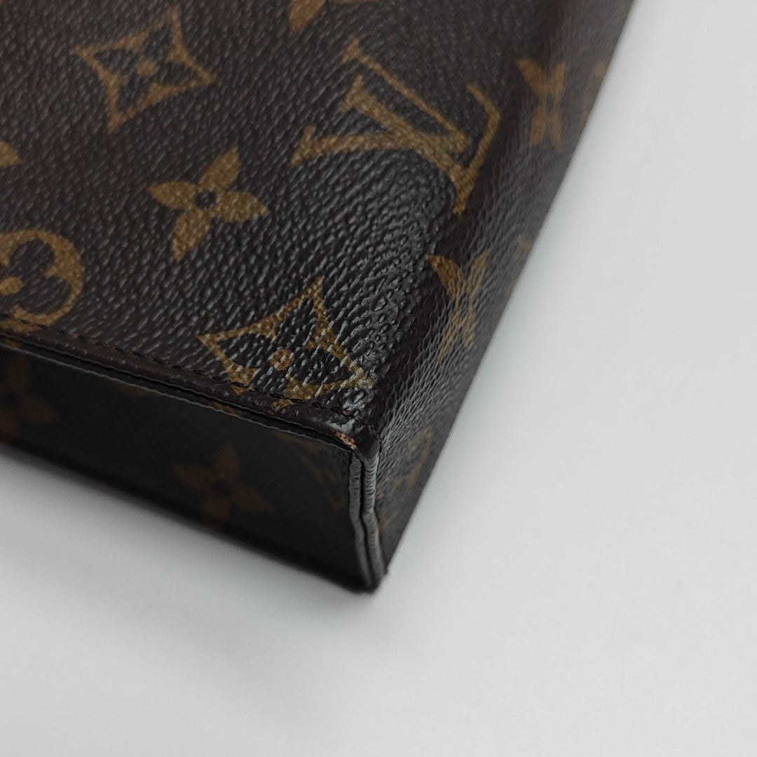 TOILET POCKET 26 Monogram Coated Canvas Brown
