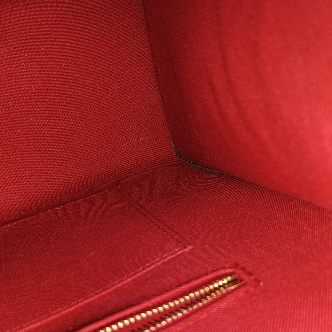 ONTHEGO MM Monogram Coated Canvas Brown
