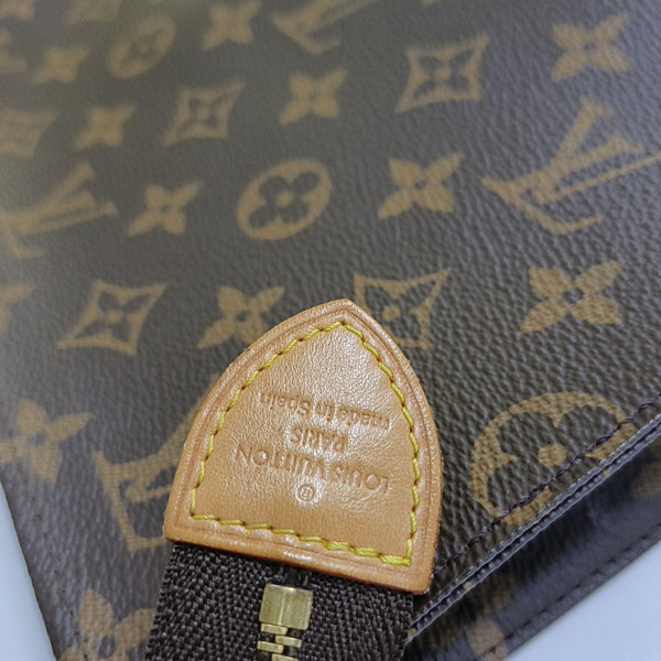 TOILET POCKET 26 Monogram Coated Canvas Brown