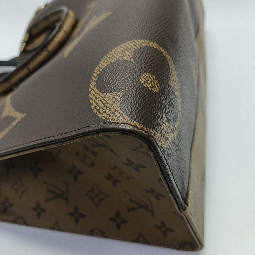 ONTHEGO MM Monogram Coated Canvas Brown
