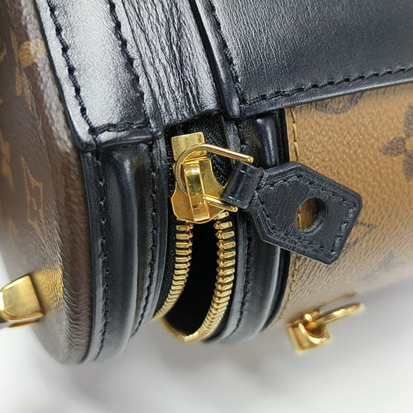 CANNES PM Monogram Coated Canvas Brown