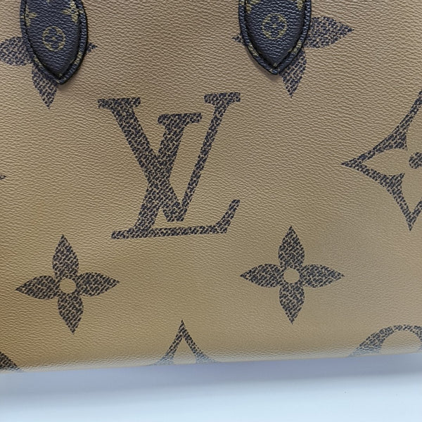 ONTHEGO MM Monogram Coated Canvas Brown