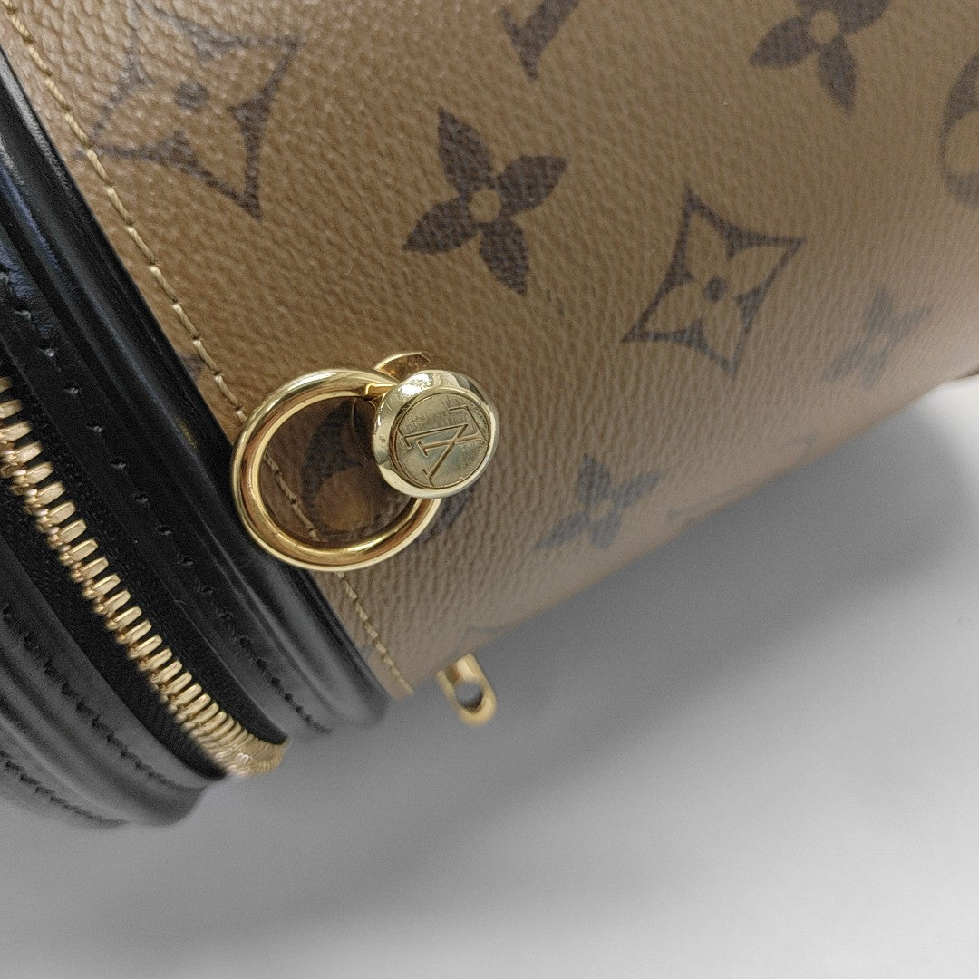 CANNES PM Monogram Coated Canvas Brown