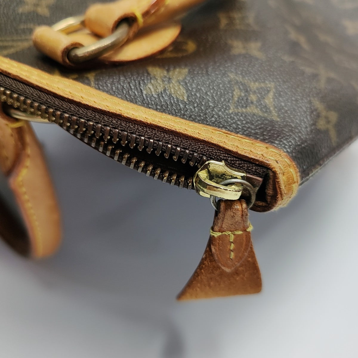 LOCKIT PM Monogram Coated Canvas Brown