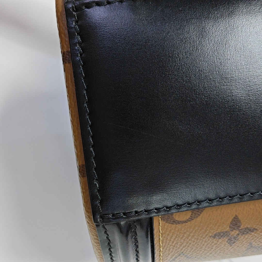 CANNES PM Monogram Coated Canvas Brown