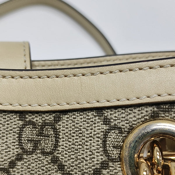 Padlock Small Monogram Coated Canvas Beige