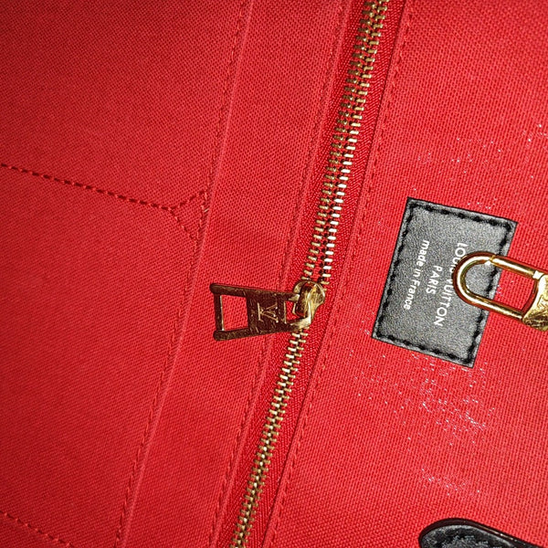 ONTHEGO MM Monogram Coated Canvas Brown