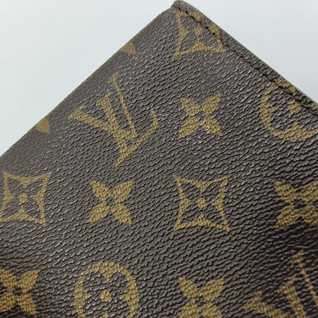 Monogram Coated Canvas Clutch Brown