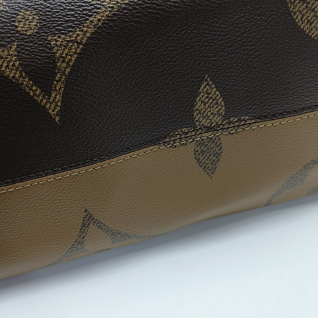 ONTHEGO MM Monogram Coated Canvas Brown