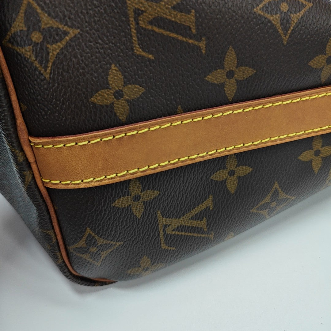 SPEEDY 25 Monogram Coated Canvas Brown