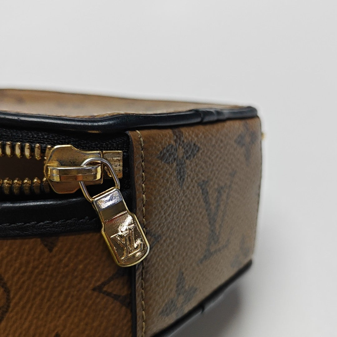 BOITE CHAPEAU Mini Monogram Coated Canvas Brown