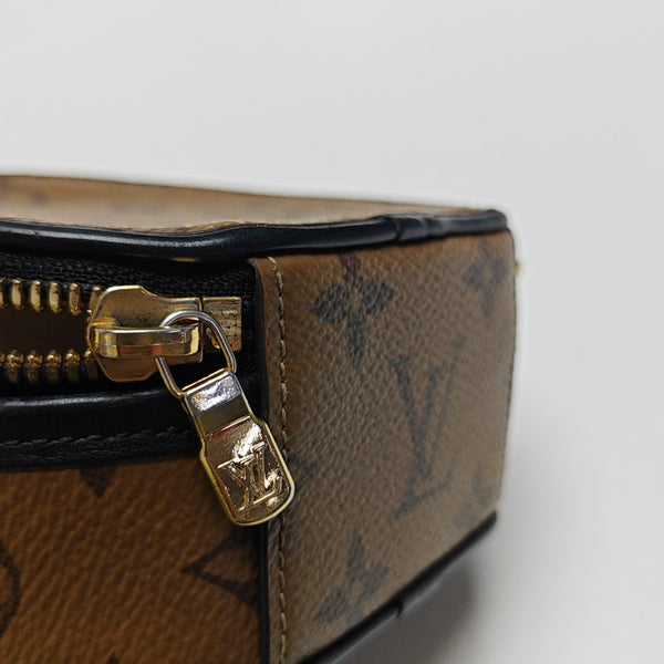 BOITE CHAPEAU Mini Monogram Coated Canvas Brown