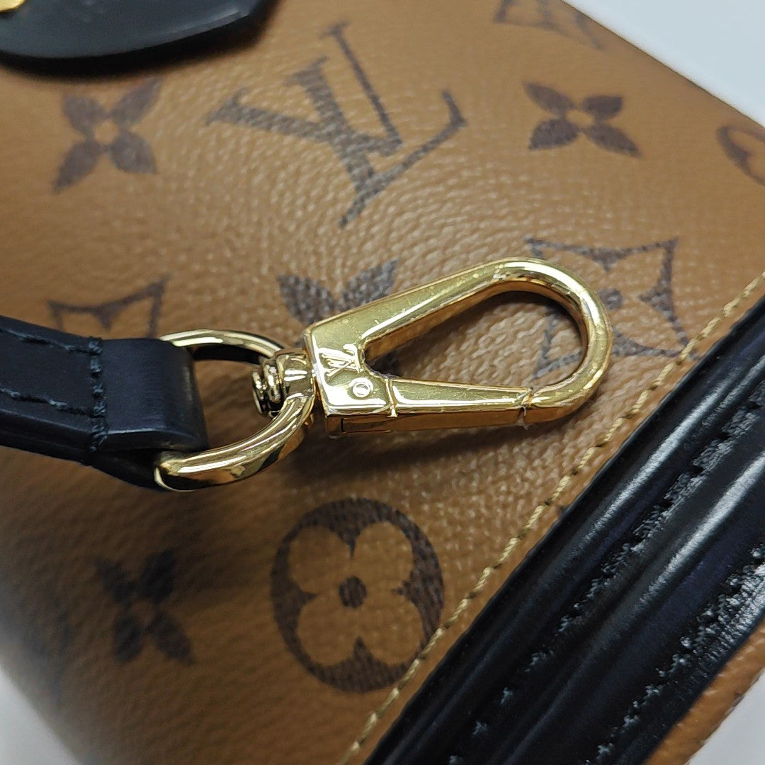 CANNES PM Monogram Coated Canvas Brown