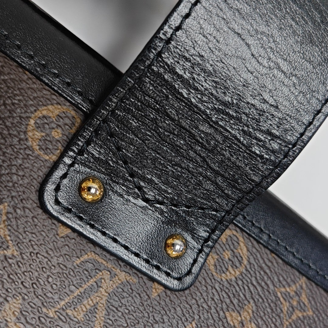 PETITE MALLE Monogram Coated Canvas Brown
