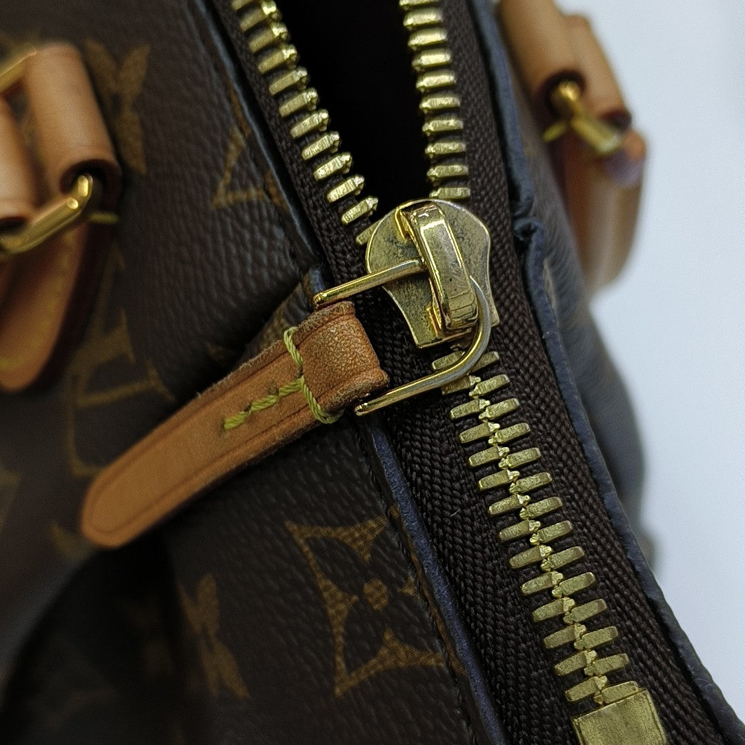 TURENNE Monogram Coated Canvas Brown