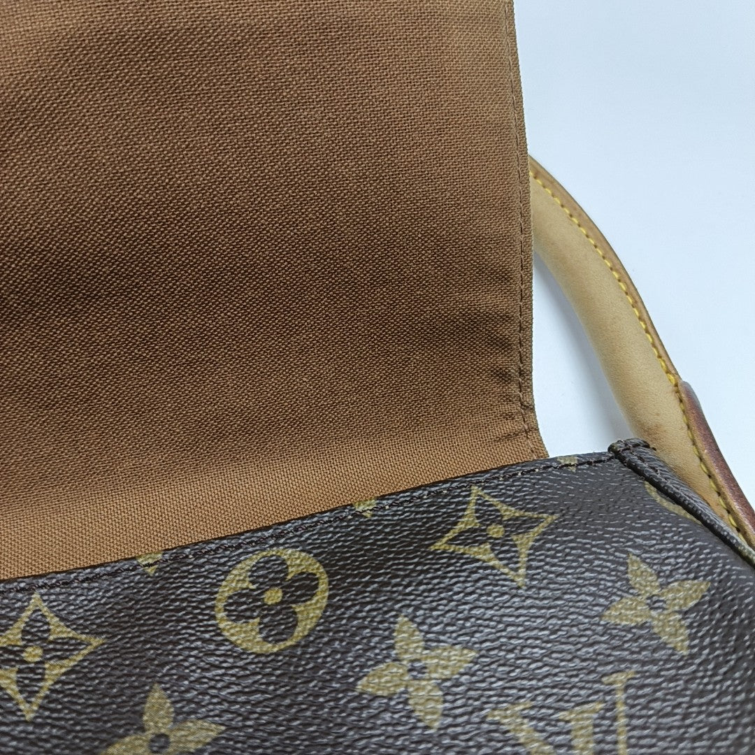 LOOPING PM Monogram Coated Canvas Brown