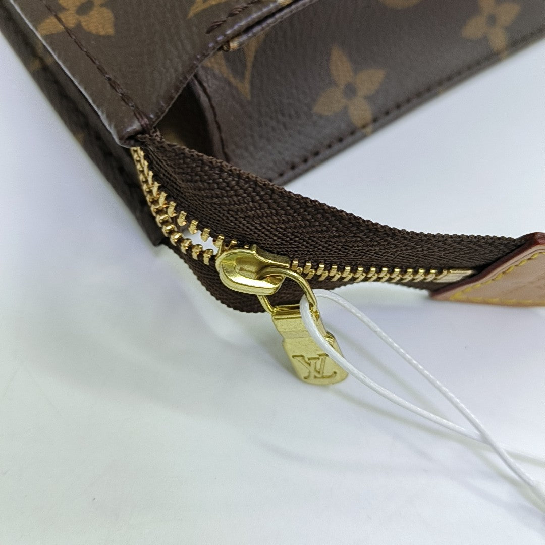 TOILET POCKET 26 Monogram Coated Canvas Brown