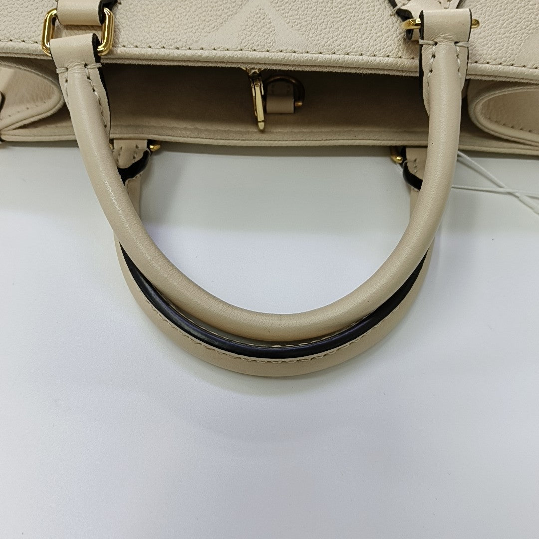 ONTHEGO PM Monogram Calfskin Beige