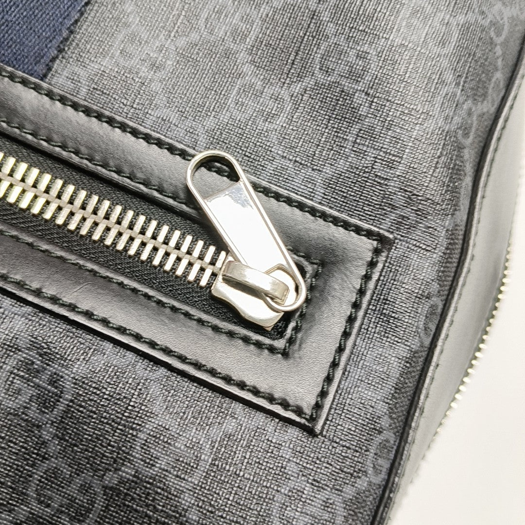 Monogram Coated Canvas Backpack Black