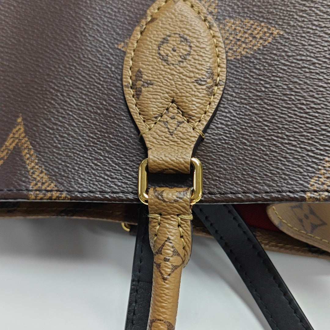 ONTHEGO MM Monogram Coated Canvas Brown