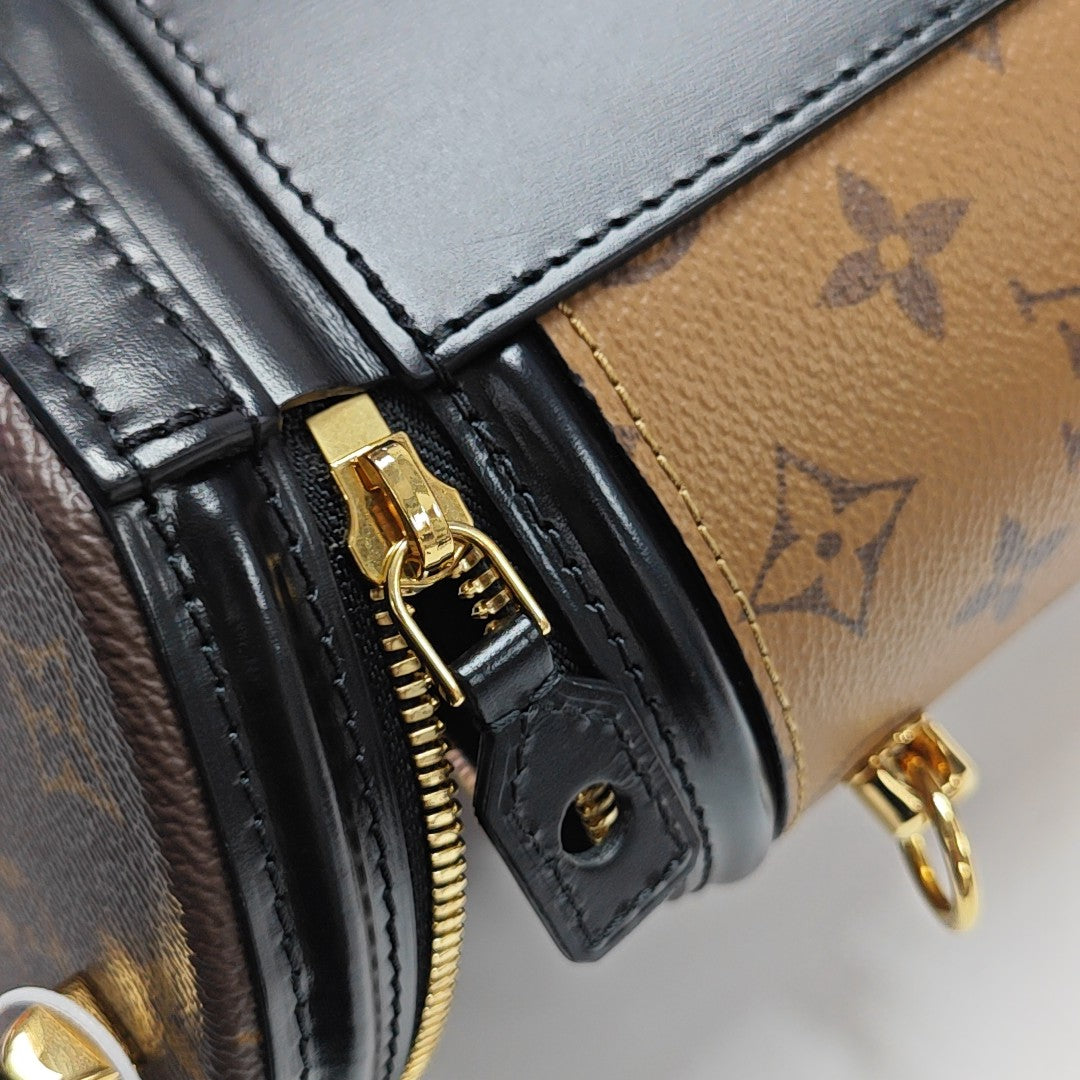 CANNES PM Monogram Coated Canvas Brown