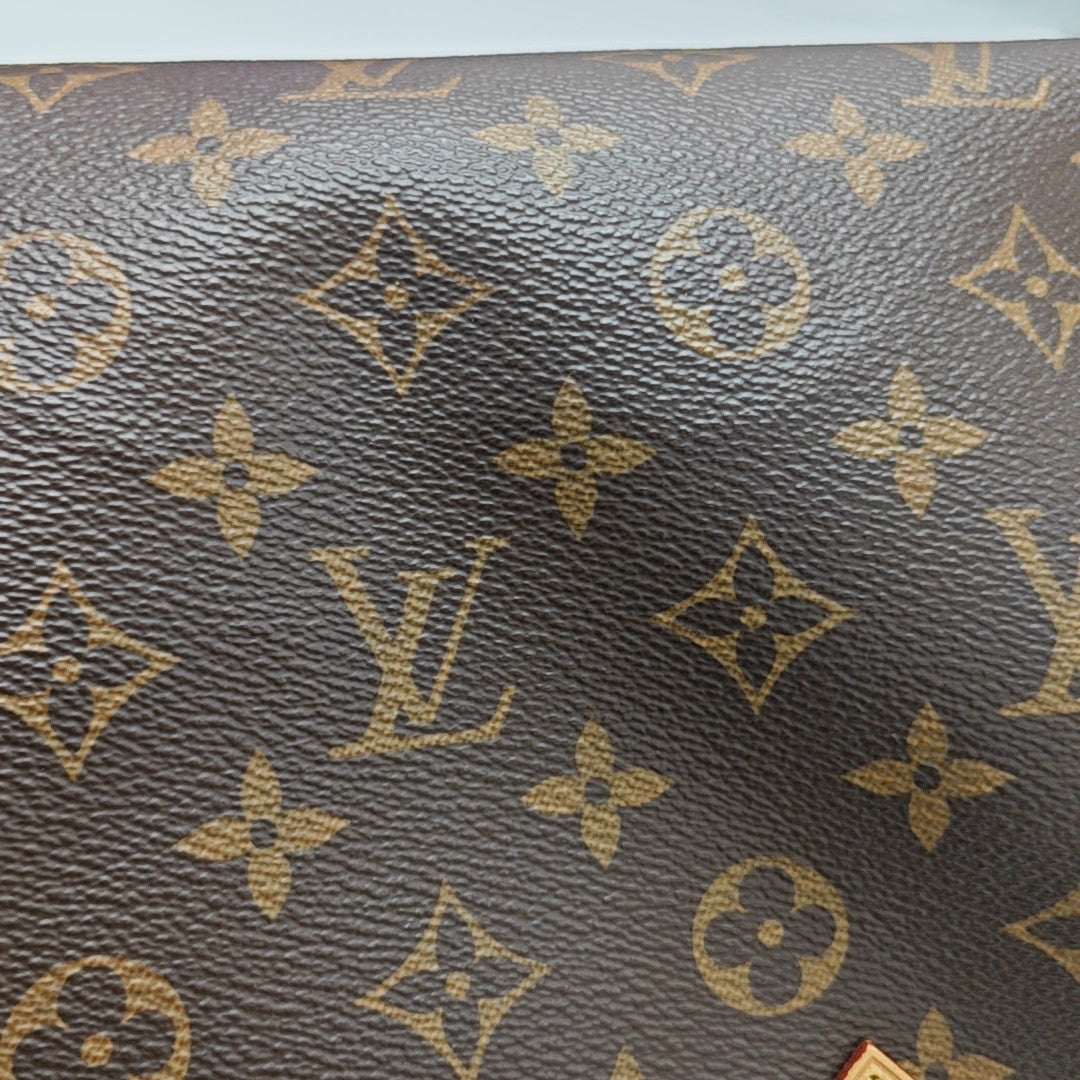 SPEEDY 25 Monogram Coated Canvas Brown
