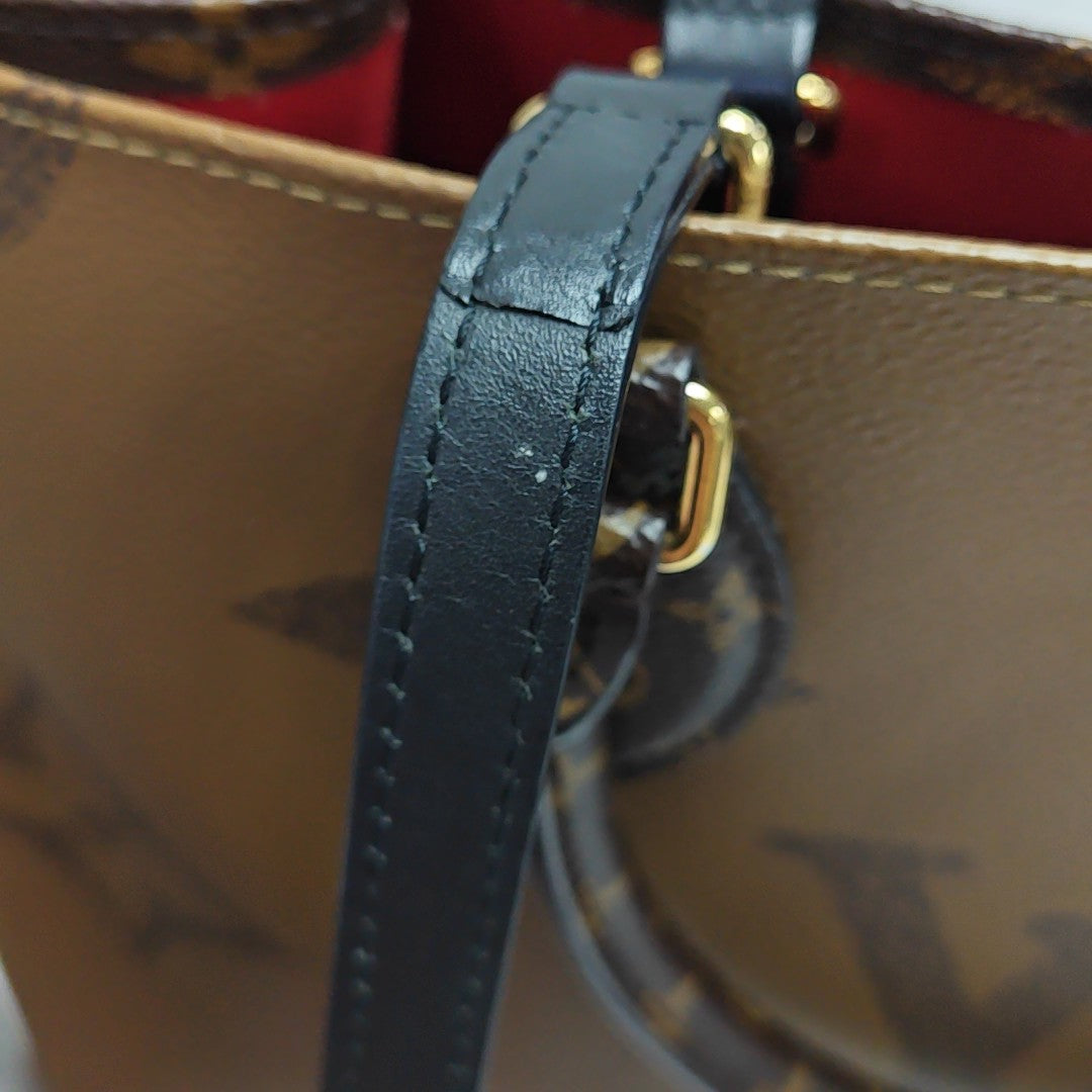 ONTHEGO MM Monogram Coated Canvas Brown