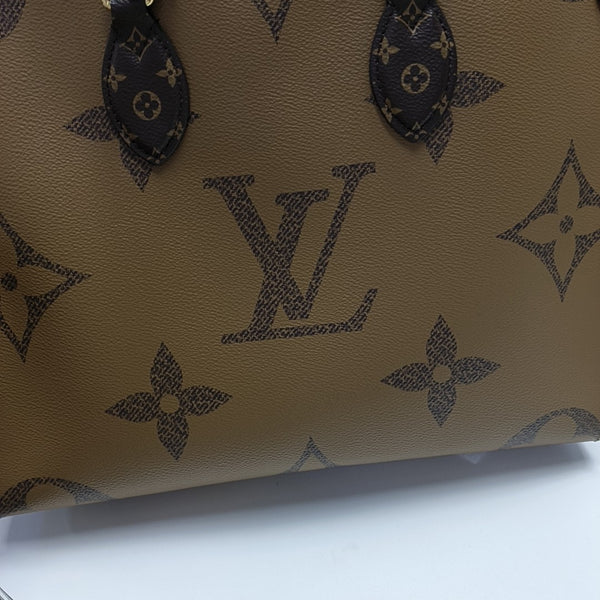 ONTHEGO MM Monogram Coated Canvas Brown