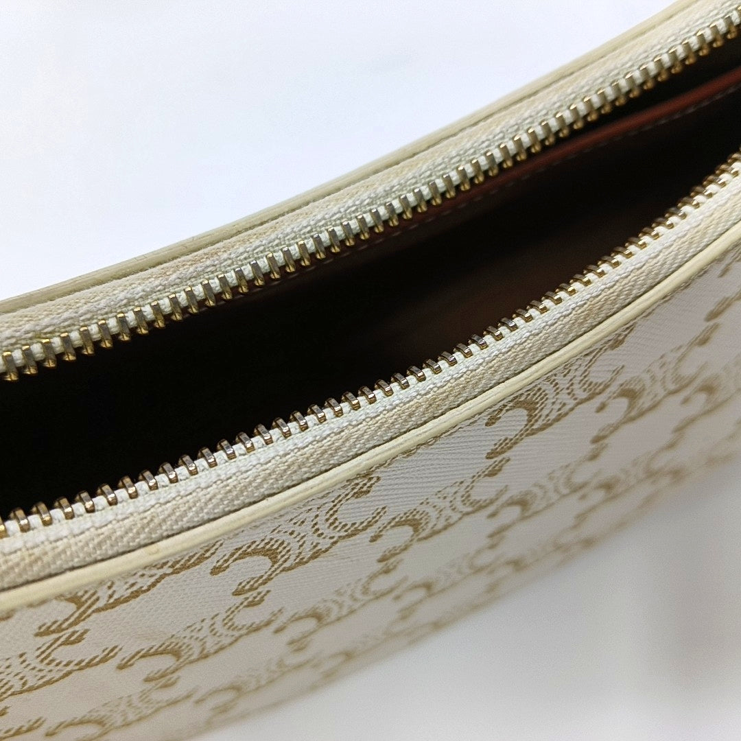 Authenticated pre-owned  AVA Coated Canvas Beige - Top Handle Bag at Looply