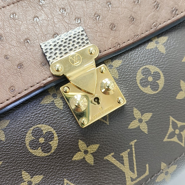 MAJESTUEUX Monogram Coated Canvas Brown