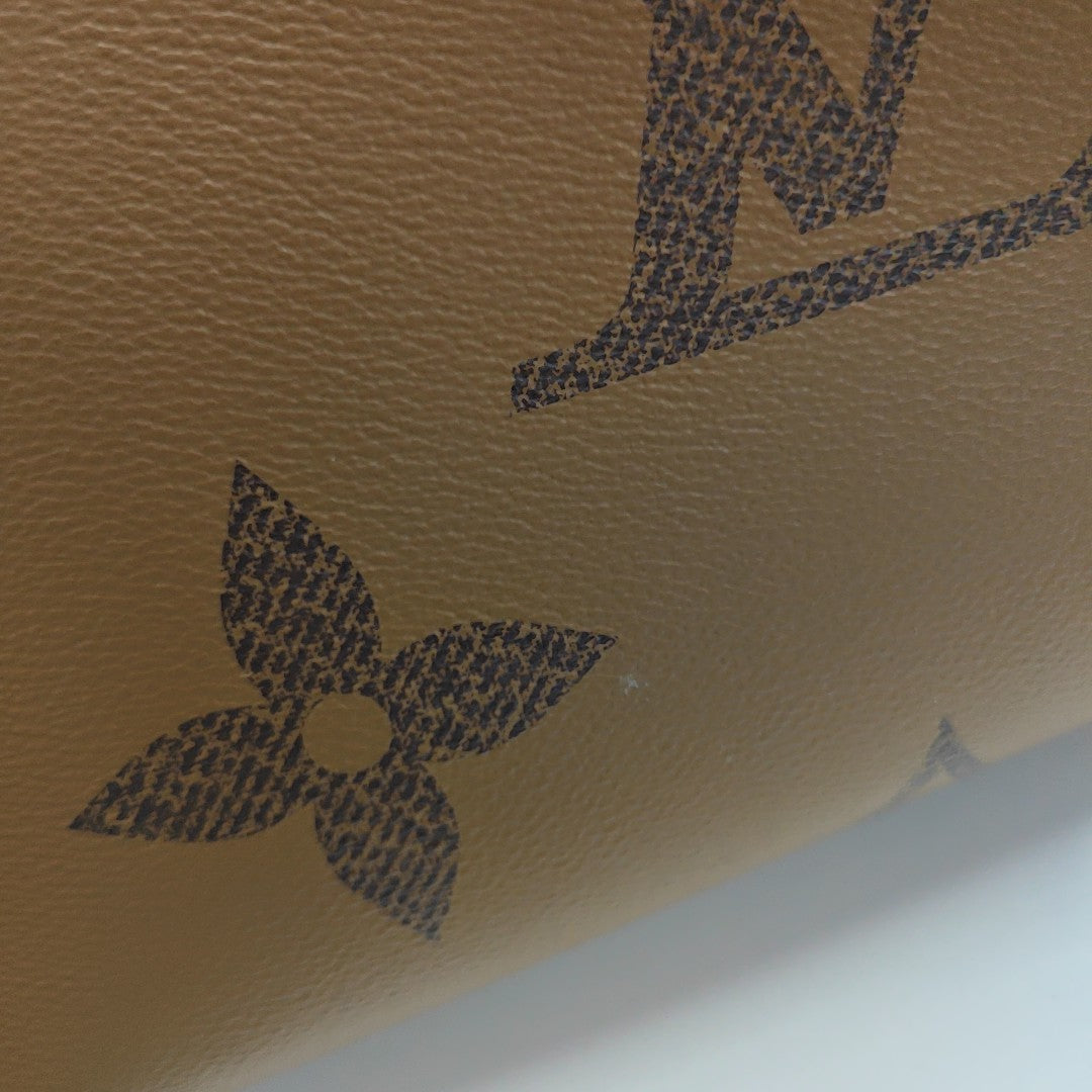 ONTHEGO MM Lona Monogram Revestida Marrón