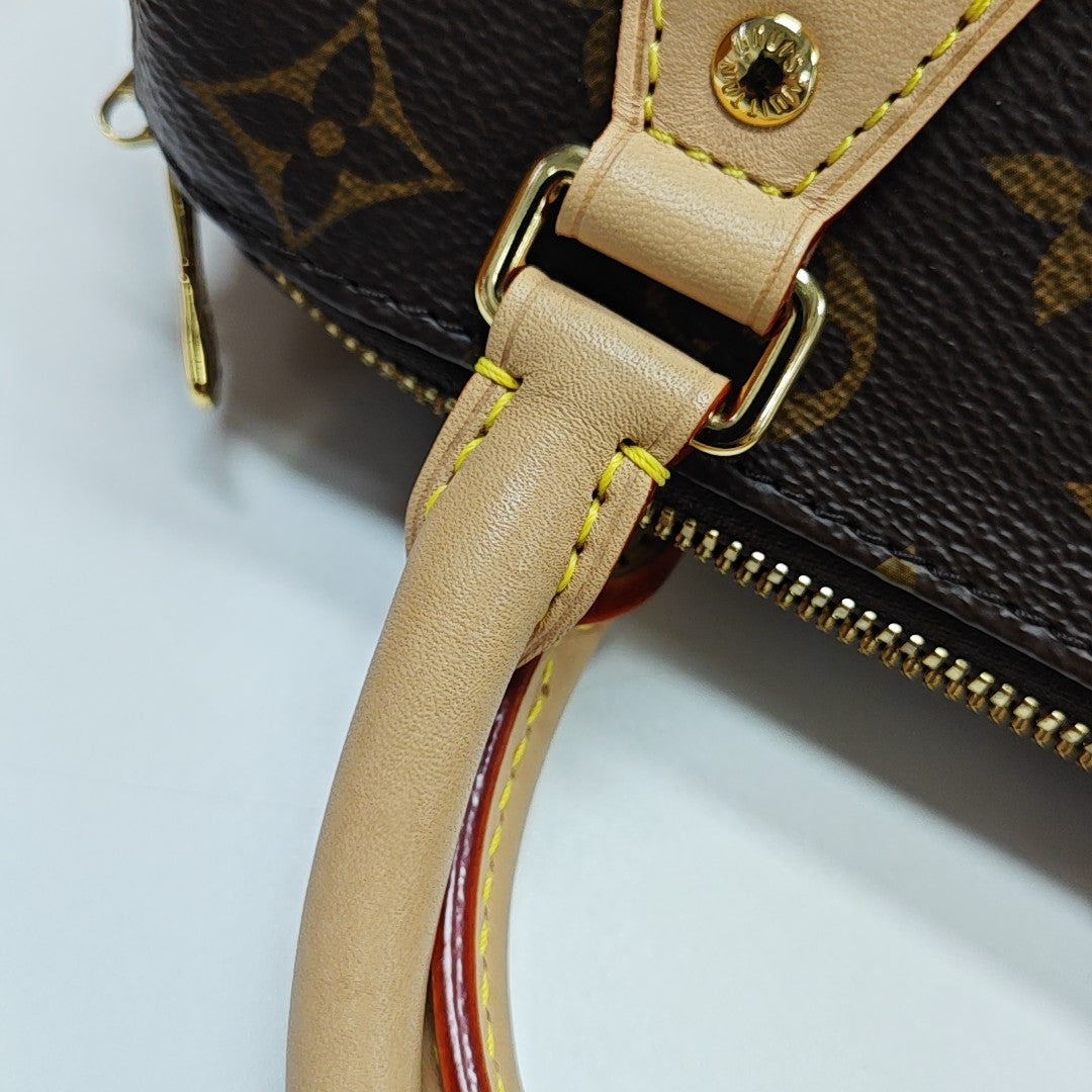 SPEEDY 20 Monogram Coated Canvas Brown