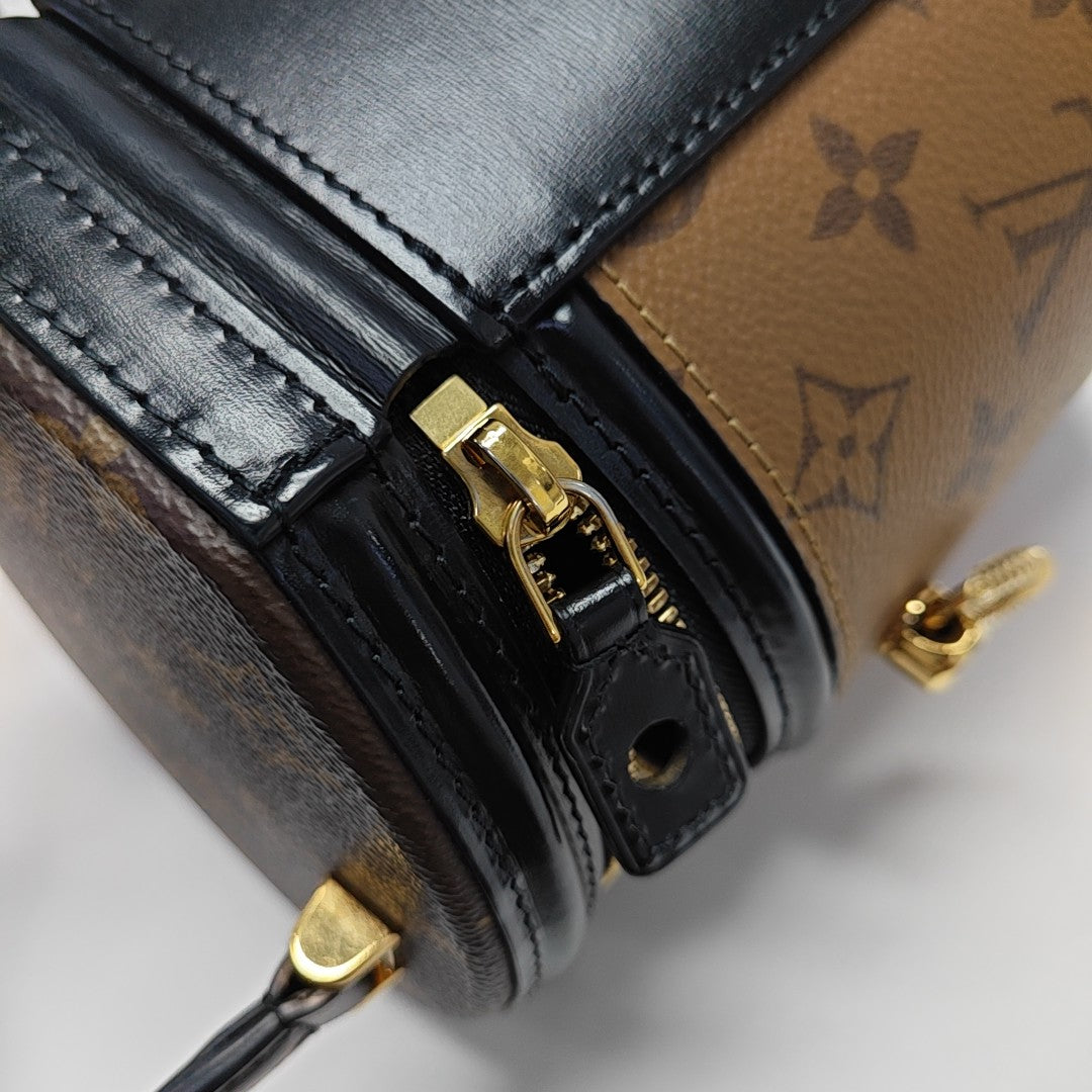 CANNES PM Monogram Coated Canvas Brown