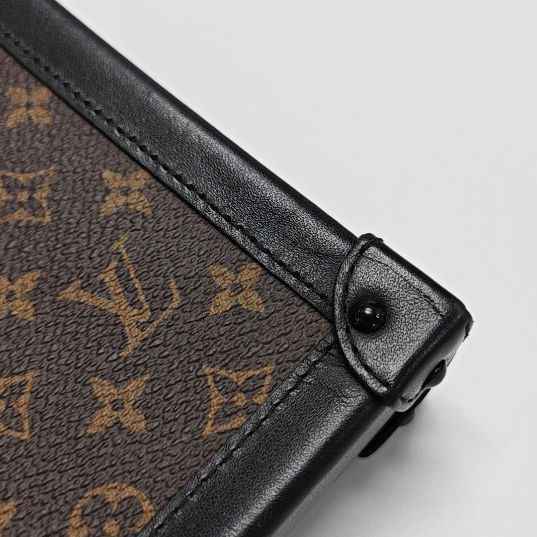 TRUNK Monogram Coated Canvas Brown