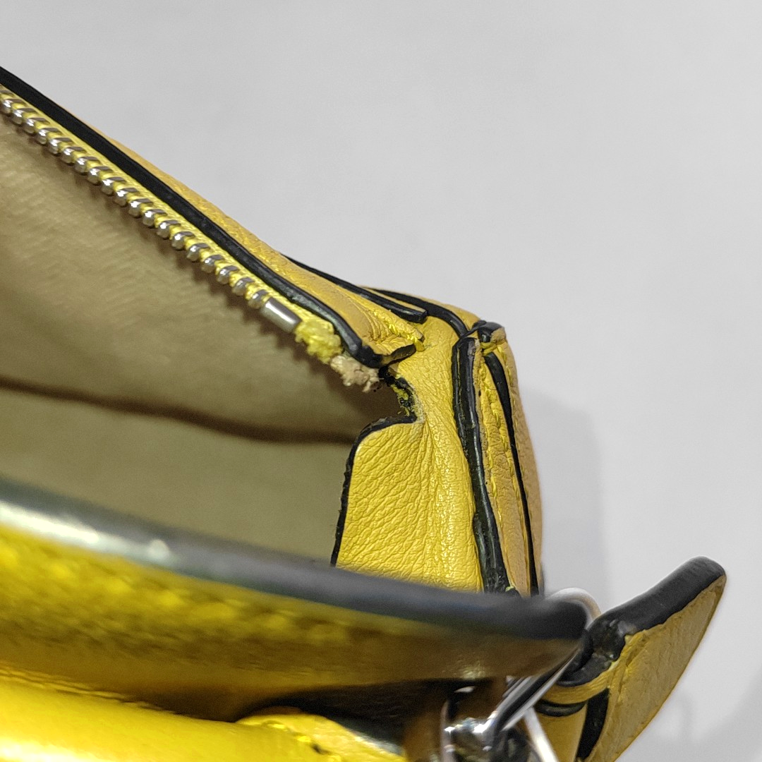 Authenticated pre-owned  Puzzle Mini Calfskin Yellow - Crossbody Bag at Looply
