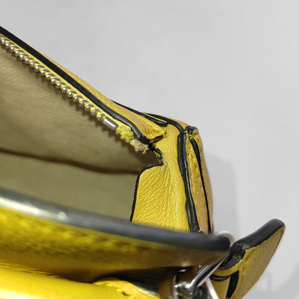 Authenticated pre-owned  Puzzle Mini Calfskin Yellow - Crossbody Bag at Looply