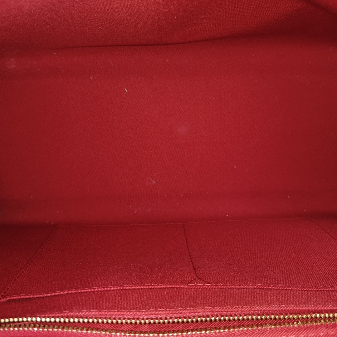 ONTHEGO MM Monogram Coated Canvas Brown