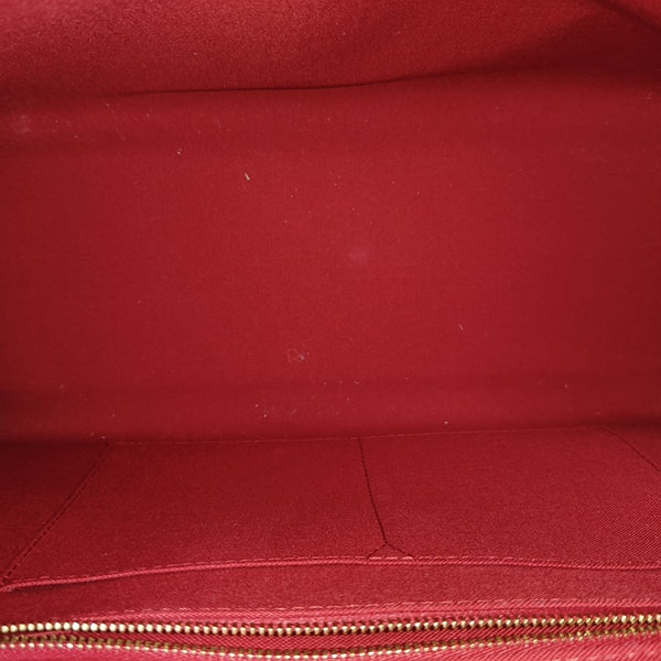 ONTHEGO MM Monogram Coated Canvas Brown
