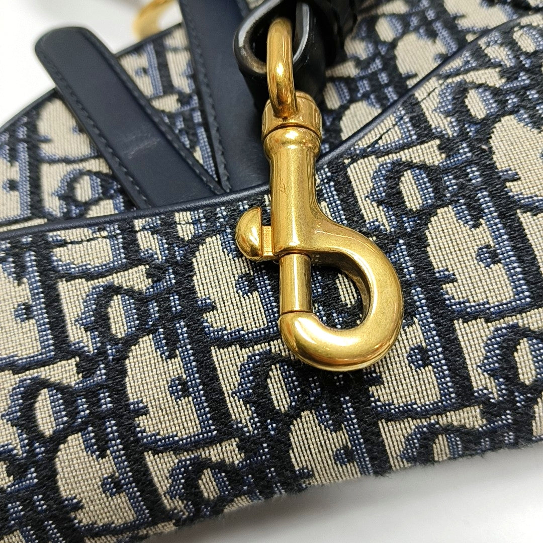 Authenticated pre-owned  Saddle Mini Oblique Canvas Blue - Crossbody Bag at Looply