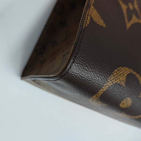 ONTHEGO GM Monogram Coated Canvas Brown