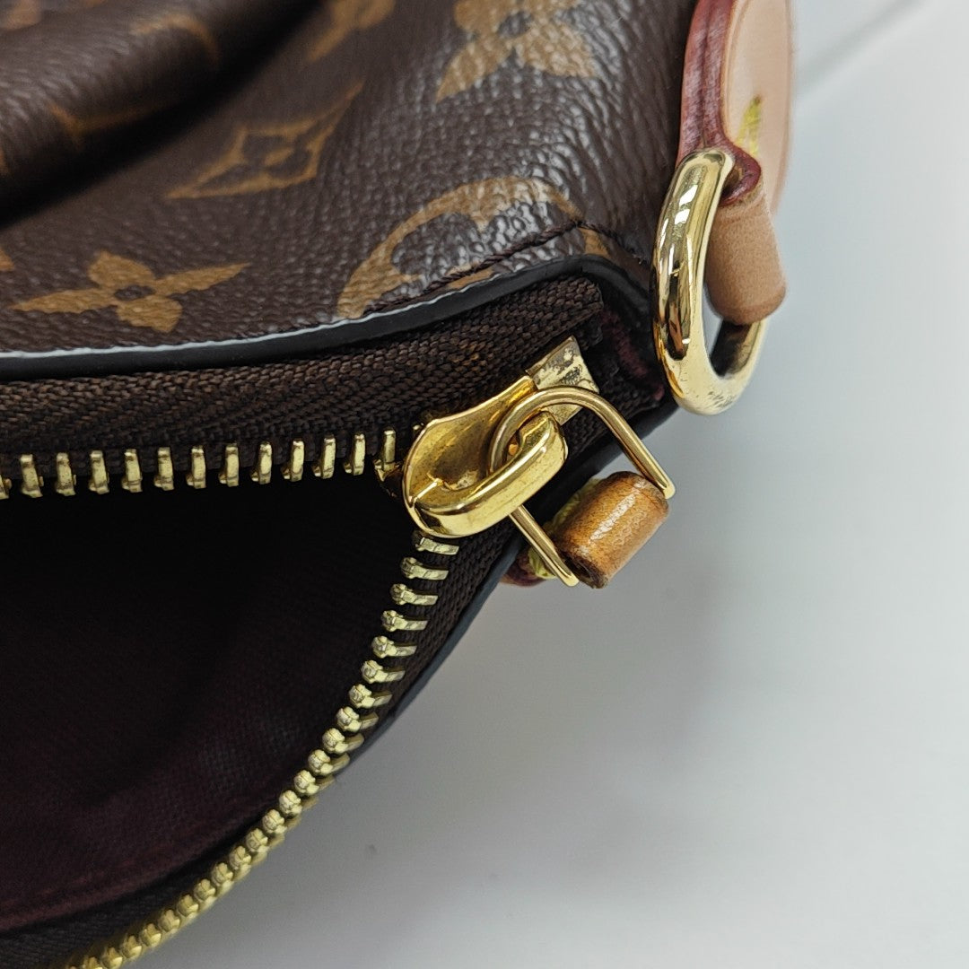 RIVOLI MM Monogram Coated Canvas Brown