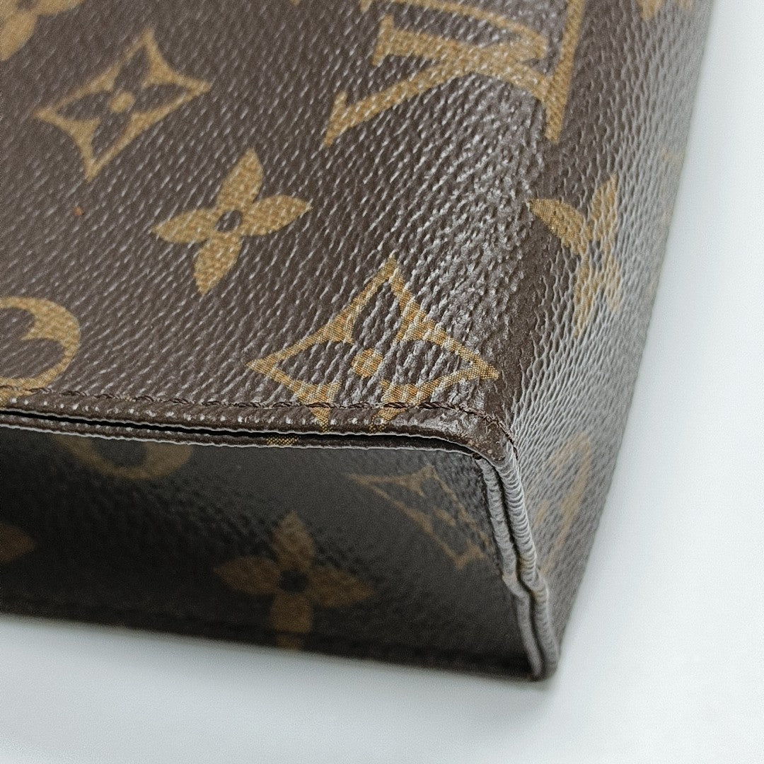 TOILET POCKET 26 Monogram Coated Canvas Brown