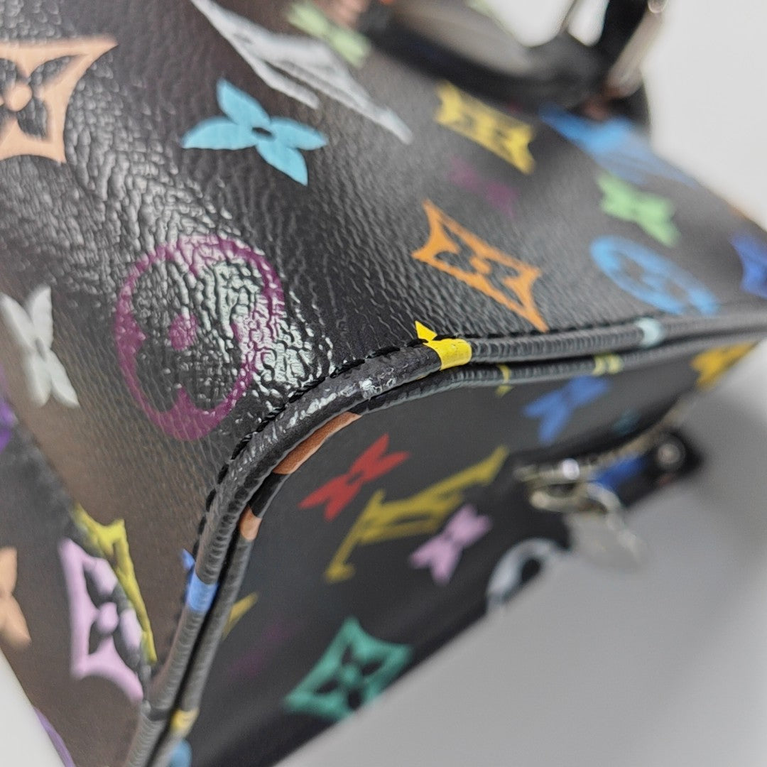 LV × TM ONTHEGO EAST WEST Chain Monogram Coated Canvas Black